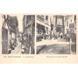 50-SAN59220-LE MONT SAINT MICHEL.La grande Rue.Vue prise de la porte du Roi