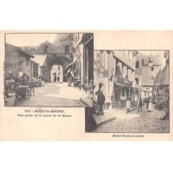 50-SAN59219-LE MONT SAINT MICHEL.L'Hôtel Poulard jeune.Vue prise de la porte de la Herse