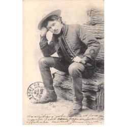61 - n°84318 - Homme assis