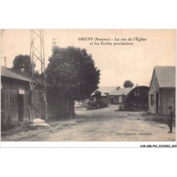 CAR-ABDP10-80-0990 - GRUNY - LA RUE DE L'EGLISE ET LES ECOLES PROVISOIRES
