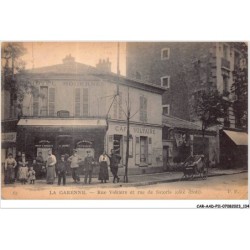 CAR-AADP11-92-0974 - LA GARENNES - Rue voltaire et Rue de Satoris - Cafe Voltaire